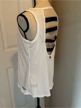 Victoria's Secret White Sport Top with Black stripes. Size M.